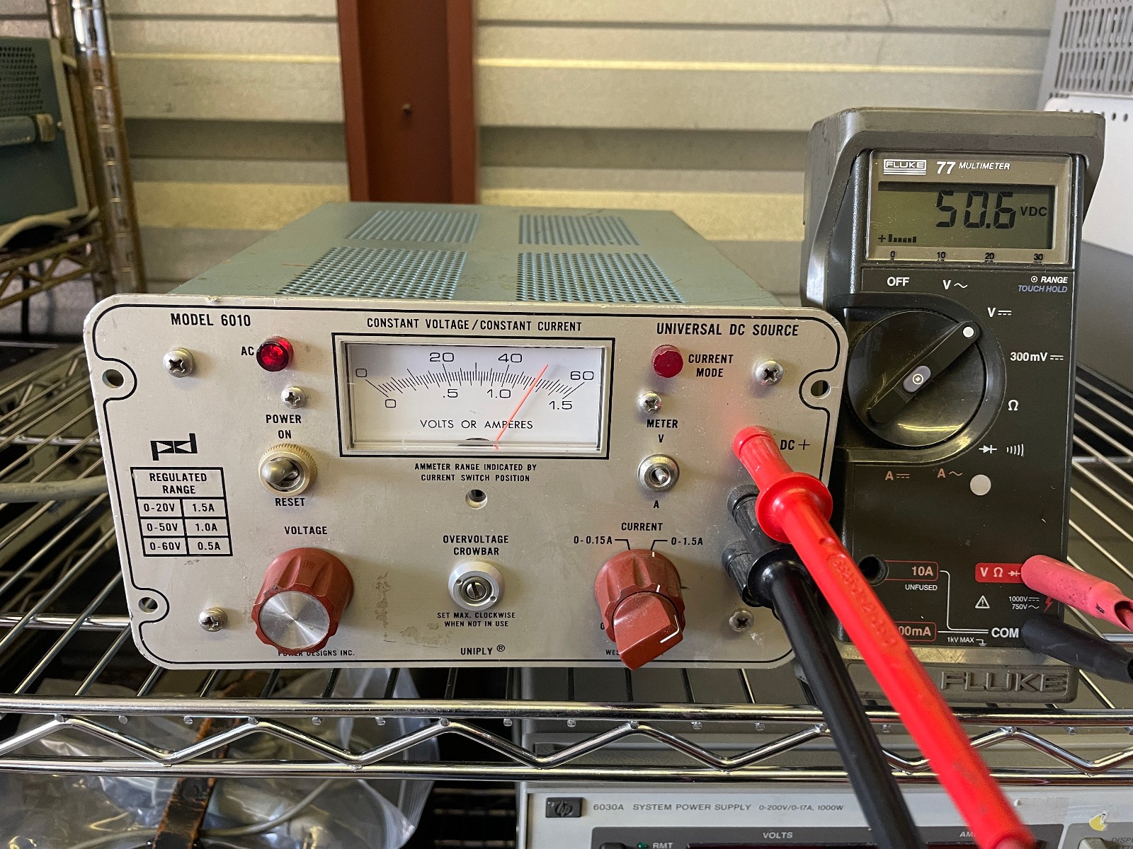 POWER DESIGNS INC MODEL 6010 0-60 V @ 0.5A , 1.5A @ 20V UNIVERSAL DC SOURCE