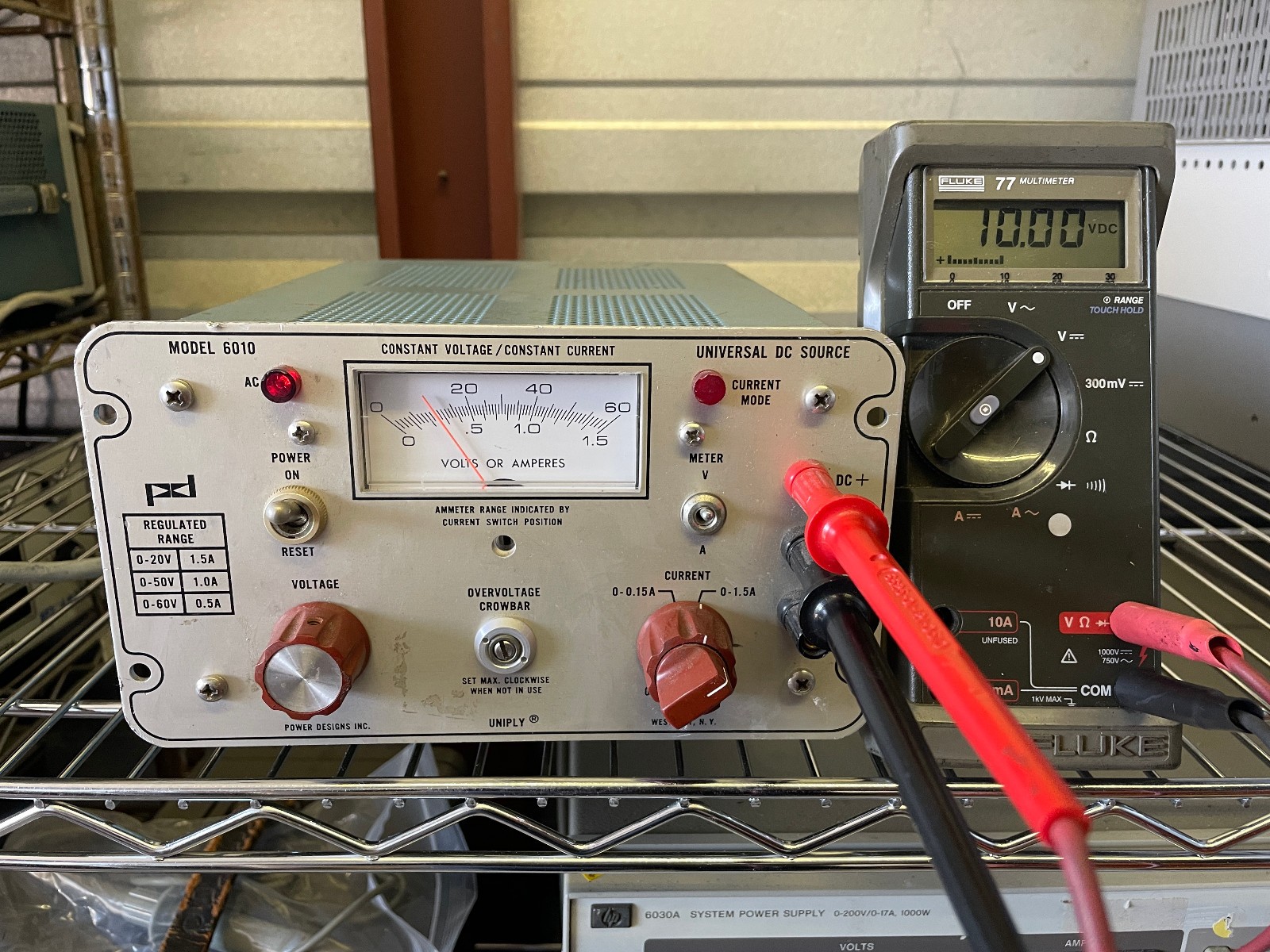POWER DESIGNS INC MODEL 6010 0-60 V @ 0.5A , 1.5A @ 20V UNIVERSAL DC SOURCE