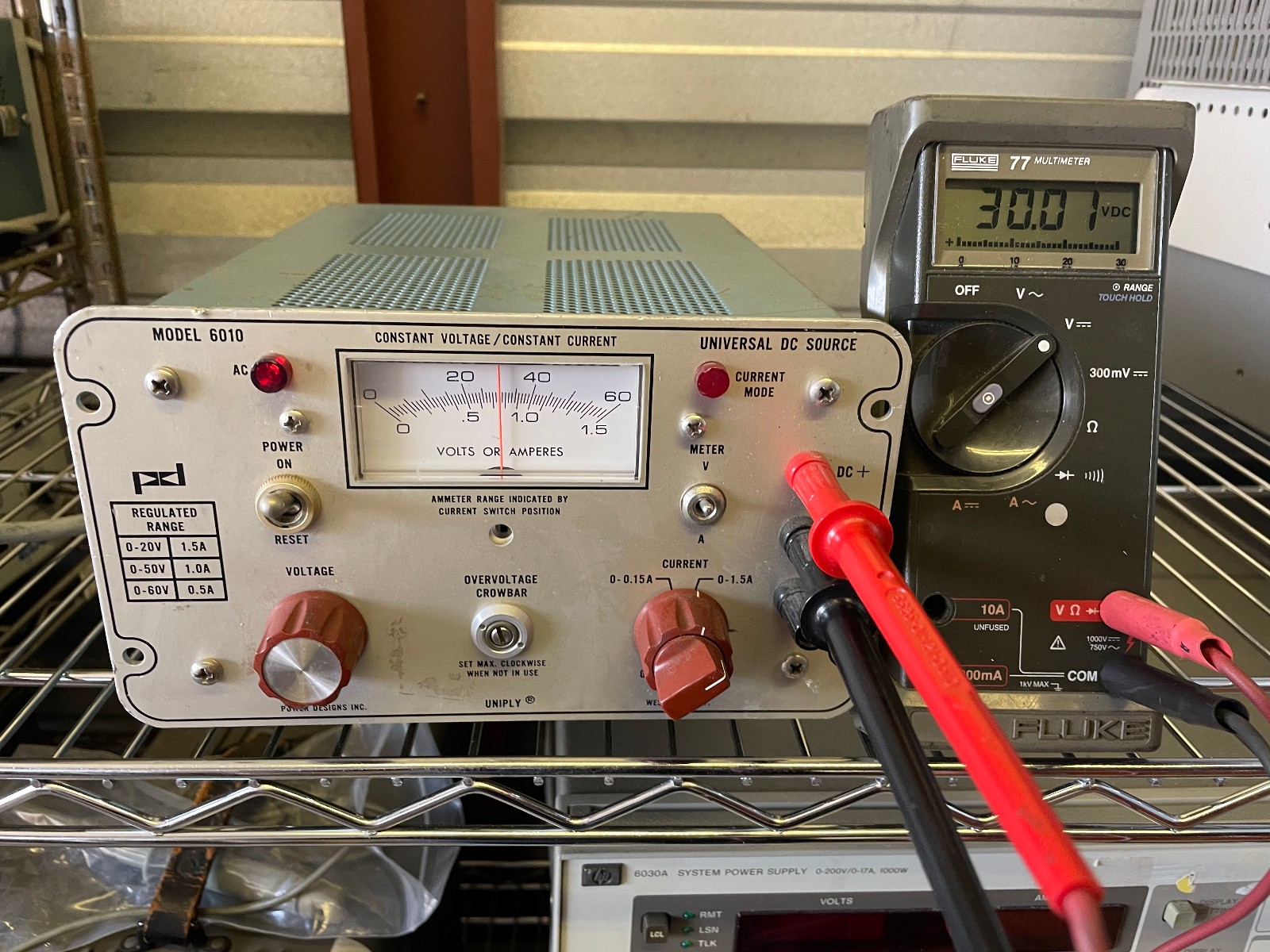POWER DESIGNS INC MODEL 6010 0-60 V @ 0.5A , 1.5A @ 20V UNIVERSAL DC SOURCE
