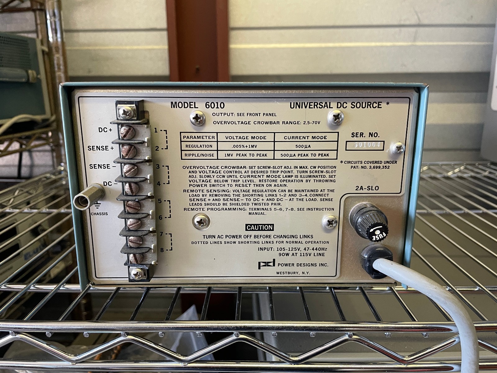 POWER DESIGNS INC MODEL 6010 0-60 V @ 0.5A , 1.5A @ 20V UNIVERSAL DC SOURCE