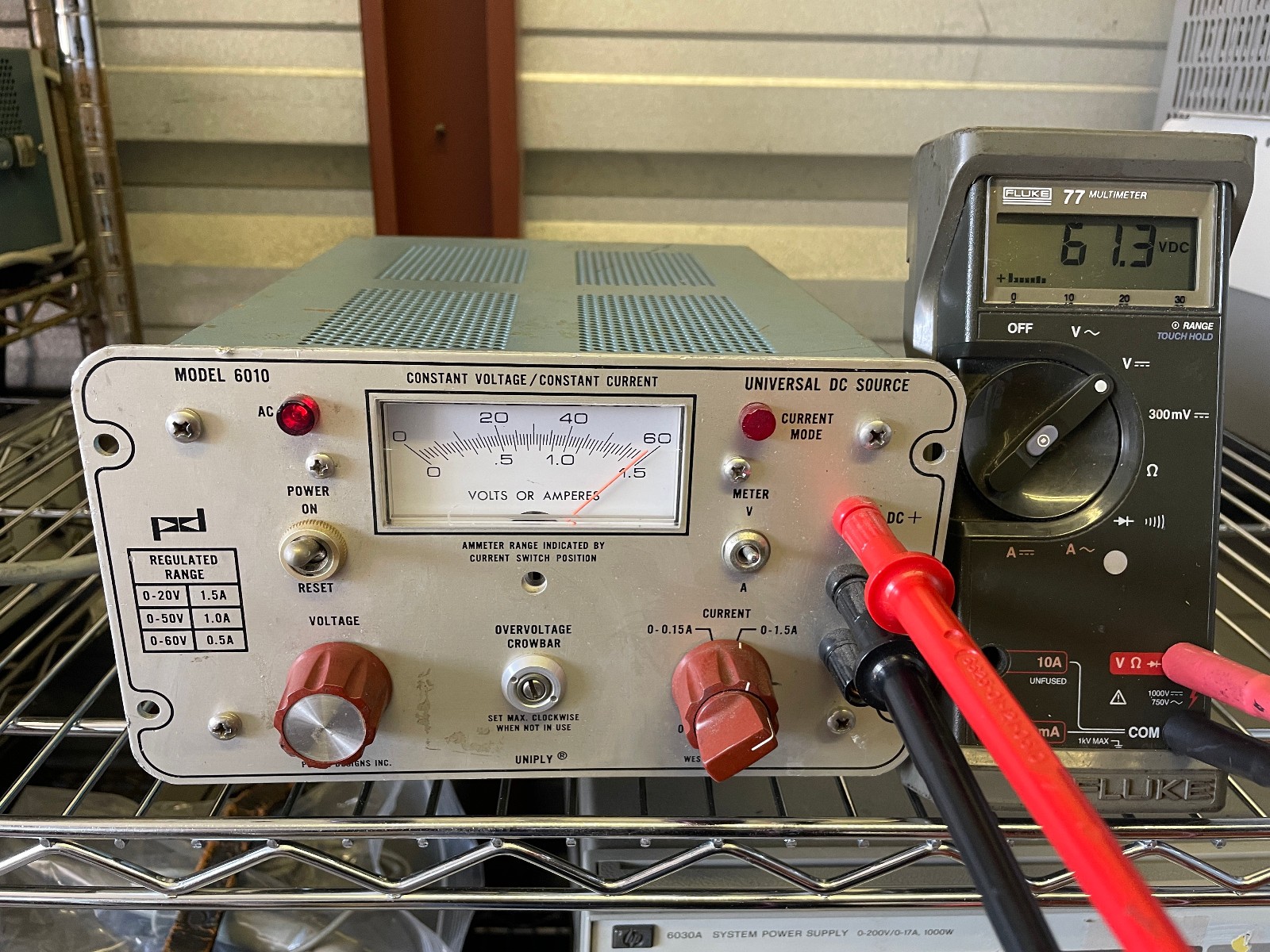 POWER DESIGNS INC MODEL 6010 0-60 V @ 0.5A , 1.5A @ 20V UNIVERSAL DC SOURCE