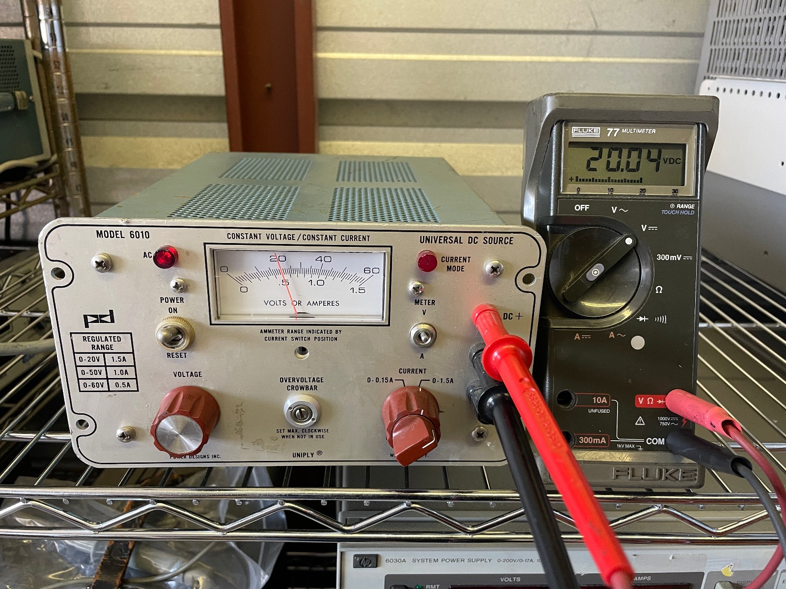 POWER DESIGNS INC MODEL 6010 0-60 V @ 0.5A , 1.5A @ 20V UNIVERSAL DC SOURCE